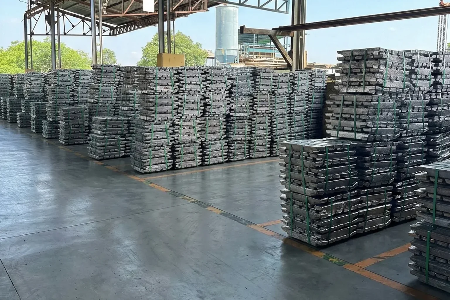 Palletized lead ingots staged for export inside the FUNMETAL warehouse